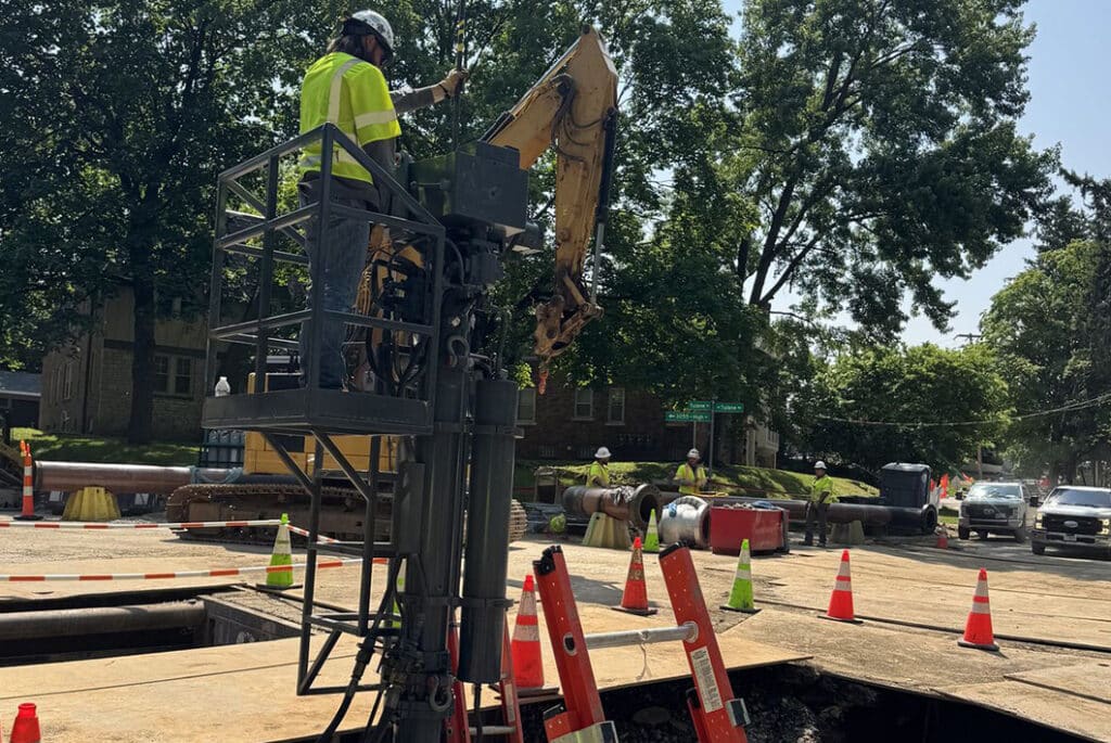 Technicians perform a 20-inch double line stop in a residential neighborhood as part of critical infrastructure maintenance, ensuring uninterrupted utility service during pipeline modifications.