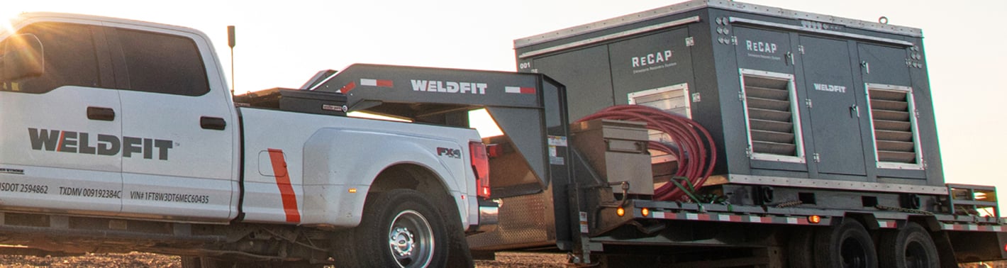 WeldFit ReCAP XR300 unit on a trailer being towed by a WeldFit truck