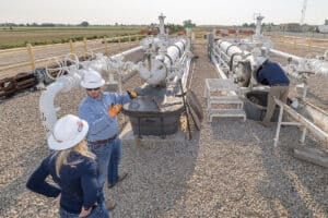 Technician team works on a Pig Launcher job site
