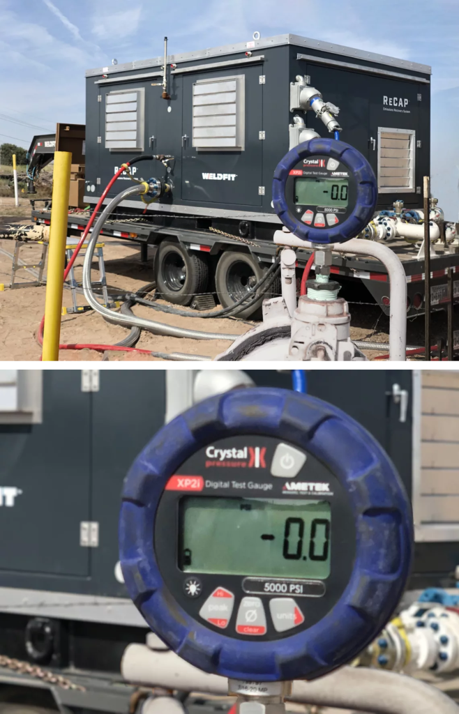 Gauge displaying 0 PSIG with a ReCAP Machine in the background